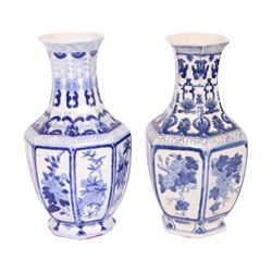Pair of blue and white vases, of octagonal form, decorated with panels of blossoming branches, H36cm