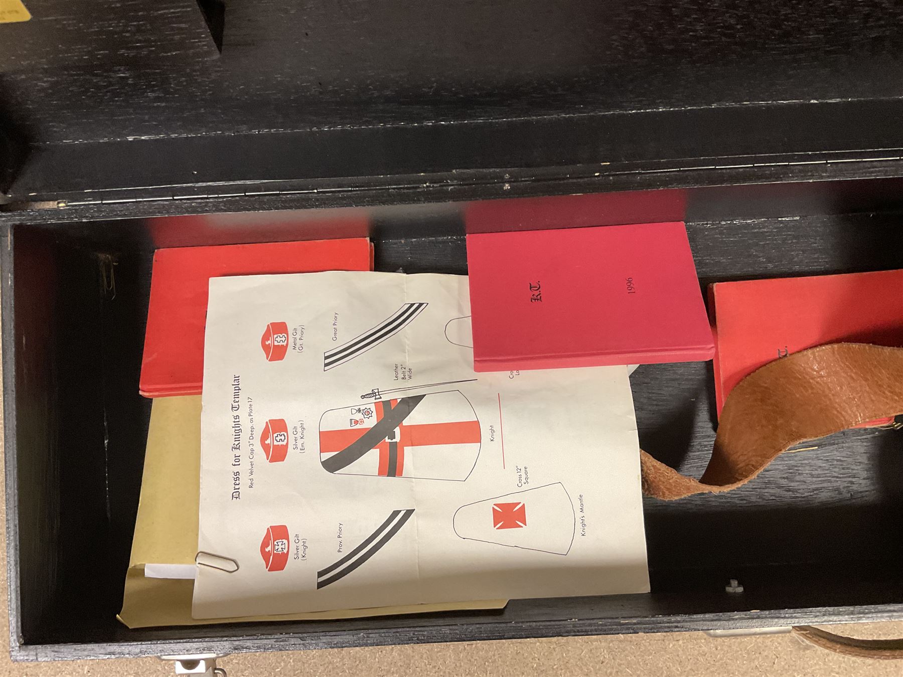 Masonic regalia, including sword, kid leather gloves and apron, Order of Holy Wisdom high priest mitre, etc, contained within briefcases and boxes 