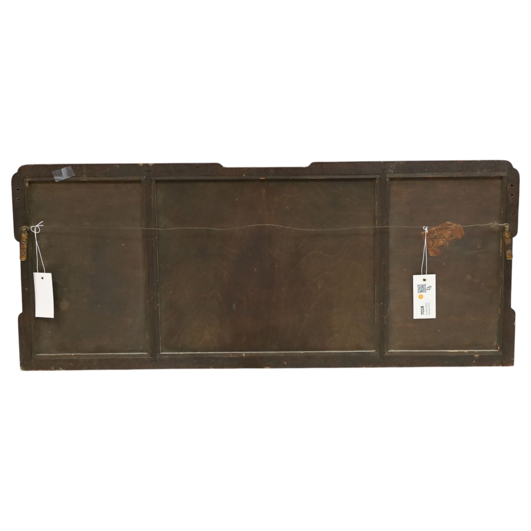 George III tripartite walnut overmantel mirror, shaped moulded frame with foliate carved gilded inner slip, enclosing an original mercury mirror plate, later applied back 