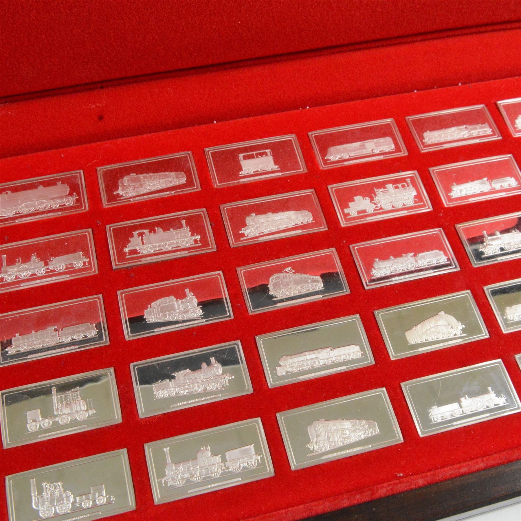 Set of fifty 'Great British Locomotives' silver ingots by  John Pinches, rectangular ingots depicting a different locomotive to each, hallmarked John Pinches, London 1978, in wooden presentation case