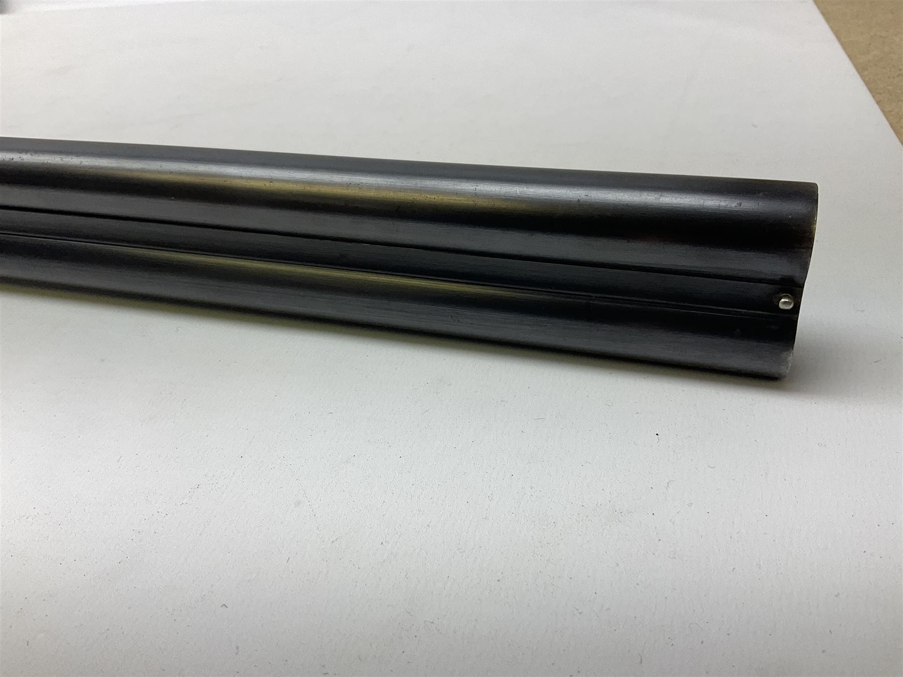 Smith Midgley Bradford 12-bore side-by-side double barrel side-lock ejector shotgun with 71cm barrels, engraved action with patented top lever, ivy leaf fences and top safety, walnut stock with chequered grip and fore-end, serial no.62409 to barrels and 1481 to action, L115cm overall SHOTGUN CERTIFICATE REQUIRED