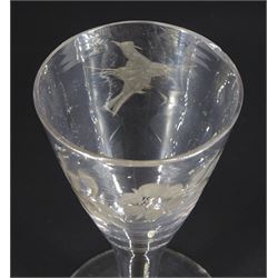 18th century drinking glass of possible Jacobite interest, the funnel bowl engraved with bird in flight and six petal rose, upon a plain stem and conical foot, H11.5cm