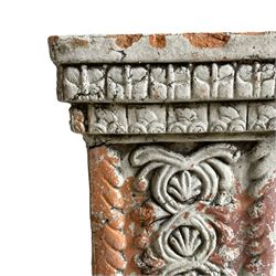 Pair of terracotta pedestals, square form and decorated with stylised leaf motifs and scrolls, stepped plinth bases