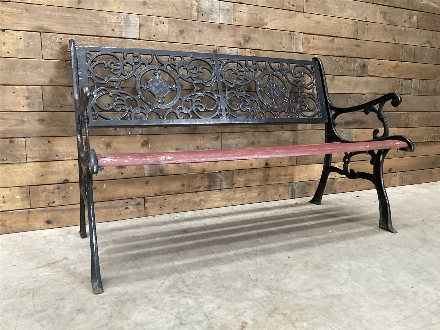 Cast iron and wood slatted garden bench