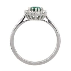 18ct white gold oval emerald and round brilliant cut diamond cluster ring, stamped, emerald approx 0.70 carat, total diamond weight approx 0.40 carat