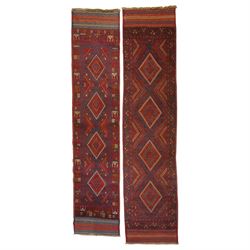 Near pair of Afghan Meshwani runner rugs, each with four red lozenge medallions on a blue ...