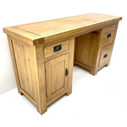 Light oak twin pedestal desk one shallow and two deep drawers, single cupboard, stile supports 