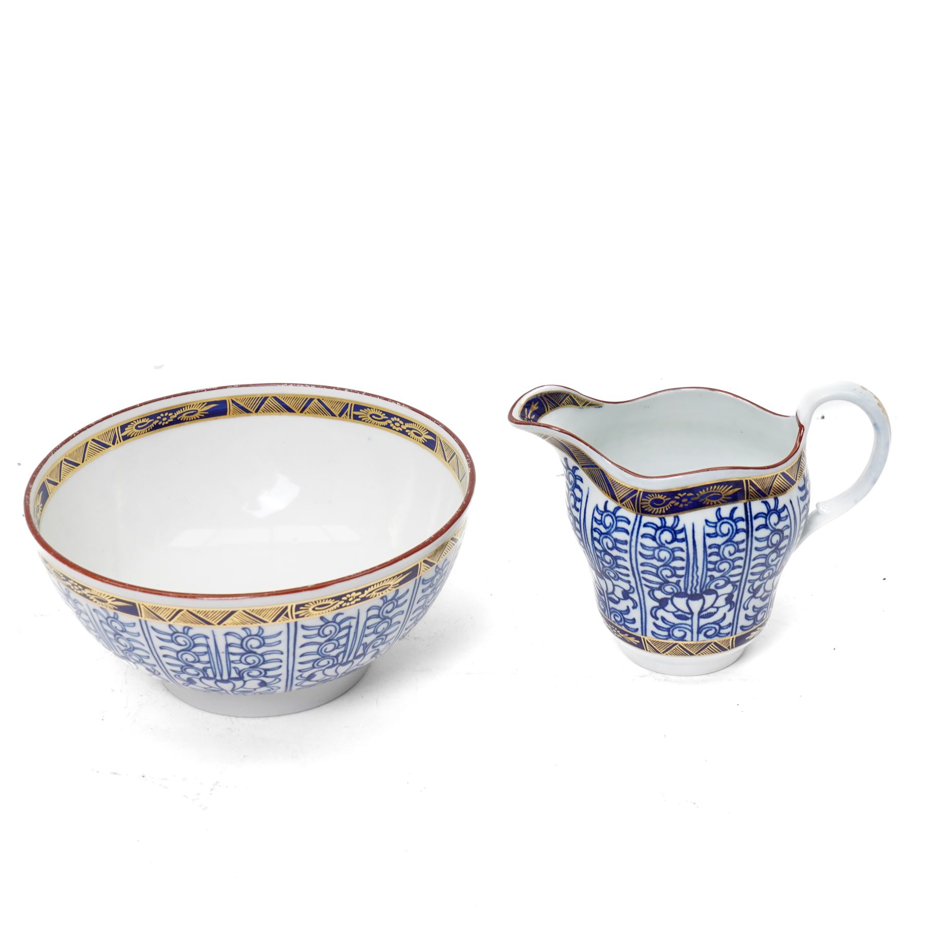 18th century Worcester 'Blue Lily' or 'Royal Lily' pattern tea and coffee service comprising twelve tea cups, twelve coffee cups, twelve saucers, tea pot, milk jug, sugar bowl, slop bowl and pair of plates, filled in crescent marks
