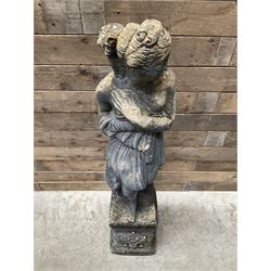Cast stone weathered garden statue of Venus on pedestal