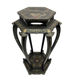 Chinese black lacquer jardinière stand, the hexagonal top painted with traditional landscape scenes within a gilt strung border, the pierced frieze with trailing foliate decoration and geometric patterns, supported on six cabriole supports united by a raised hexagonal base