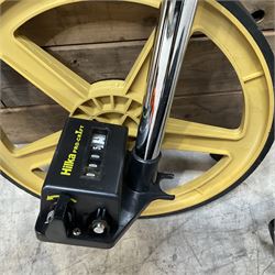 Collection of surveyors equipment including an automatic level and tripod stand and Hilka Pro Craft distance measuring wheel
