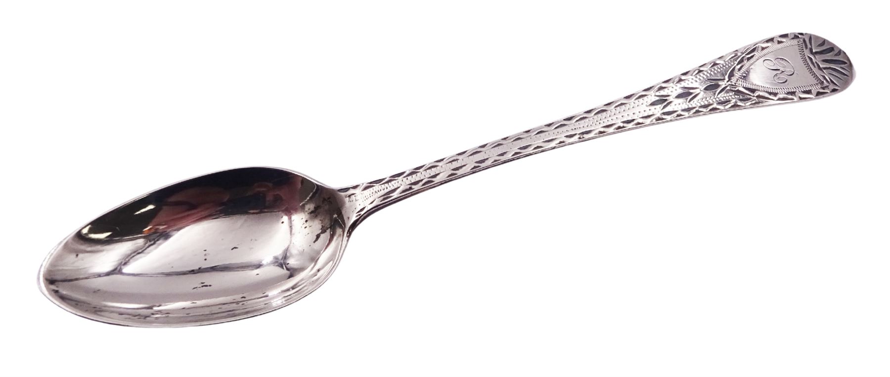 Set of twelve George III and later matched Celtic point pattern teaspoons, with bright cut engraved decoration, various hallmarks, to include a pair of William IV examples hallmarked James Beebe, London 1832, a further pair of William IV examples hallmarked William Chawner II, London 1830, approximate total weight 5.40 ozt (168.1 grams)