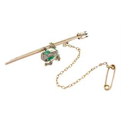 Edwardian frog and spear brooch, the gold and silver green enamel spinning frog set with old cut diamonds and stone set eyes, sat on a gold spear, with registered design number Rd 364025