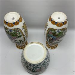 Pair of Chinese vases decorated with central panel of figures surrounded by smaller orange and blue panels decorated with foliate design, H41CM, and a Chinese jardinière / fish bowl decorated with green and pink foliate design and key fret upper rim, H21cm