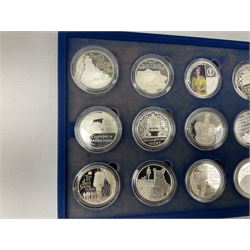 The Queen's Diamond Jubilee silver proof coin collection, consisting of twenty-four coins from Commonwealth countries, produced by The Royal Mint, housed in a blue presentation case, with certificate stating this is number 1397 of 15000 produced
