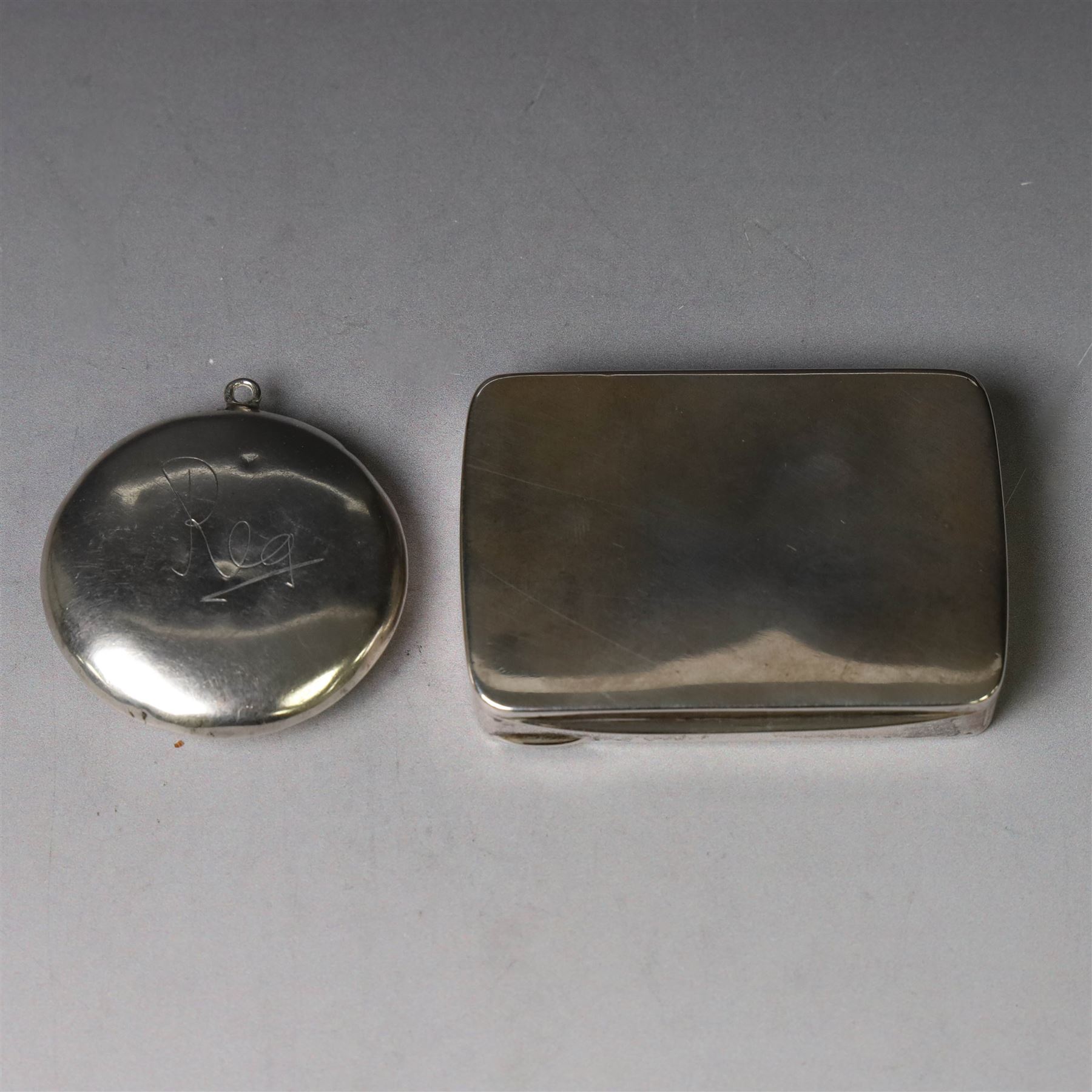 Edwardian silver compact, of circular form with mirror to interior, engraved with name to cover and underside, hallmarked S Blanckensee & Son Ltd, Birmingham 1910, together with a plain continental silver snuff box, stamped 800, box W8cm