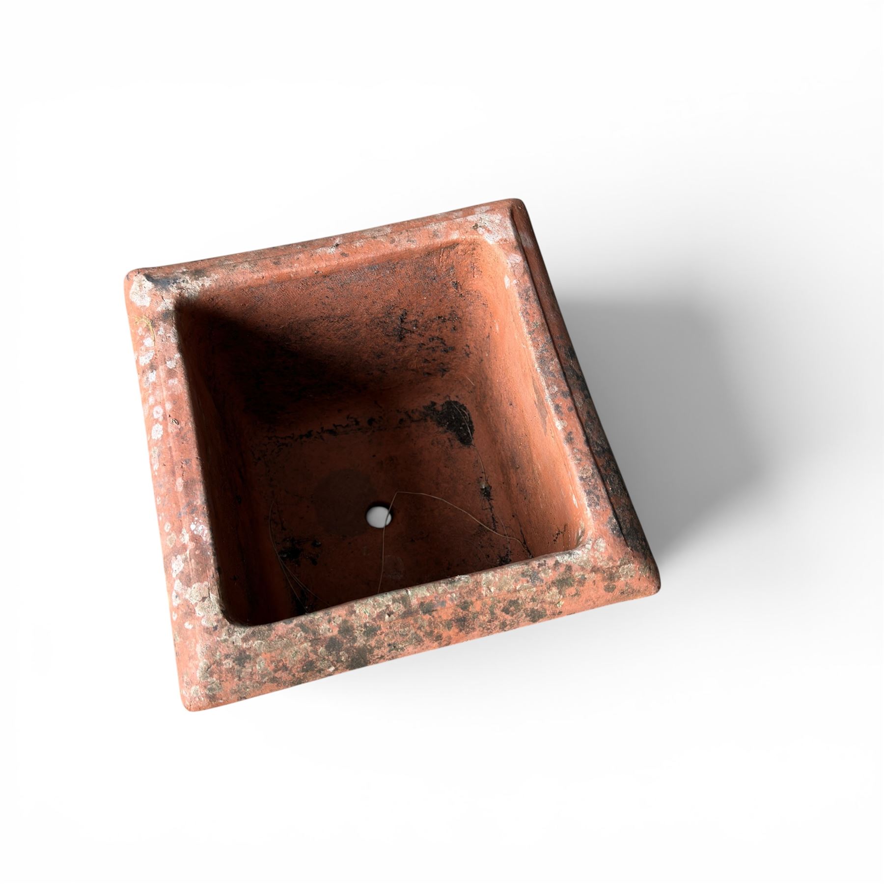 Collection of five terracotta garden planters along with rectangular sandstone trough 