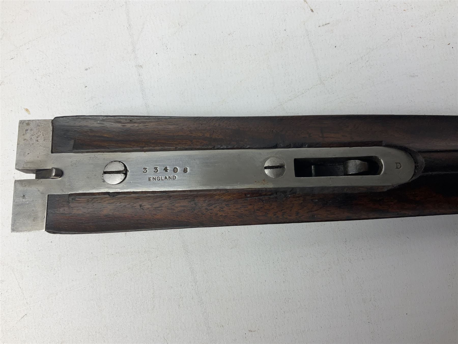 W.W. Greener 12-bore side-by-side double barrel non-ejector shotgun, with 76cm barrels, side safety, engraved lock, figured walnut stock with chequered grip and fore-end, no.33408, 120.5cm overall; in fitted canvas covered case with tools and accessories including .22 12-bore dog training device. SHOTGUN CERTIFICATE REQUIRED.