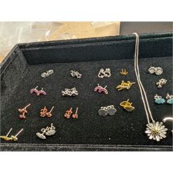 Group of silver earrings, including rainbows, clouds, skulls, crosses, etc, stamped 925