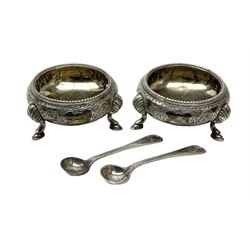 Pair of Victorian silver table salt cellars of cauldron form with gilt interiors, together with accompanying salt spoons, hallmarked Martin, Hall & Co, Sheffield 1879, total weight approx 100.5g
