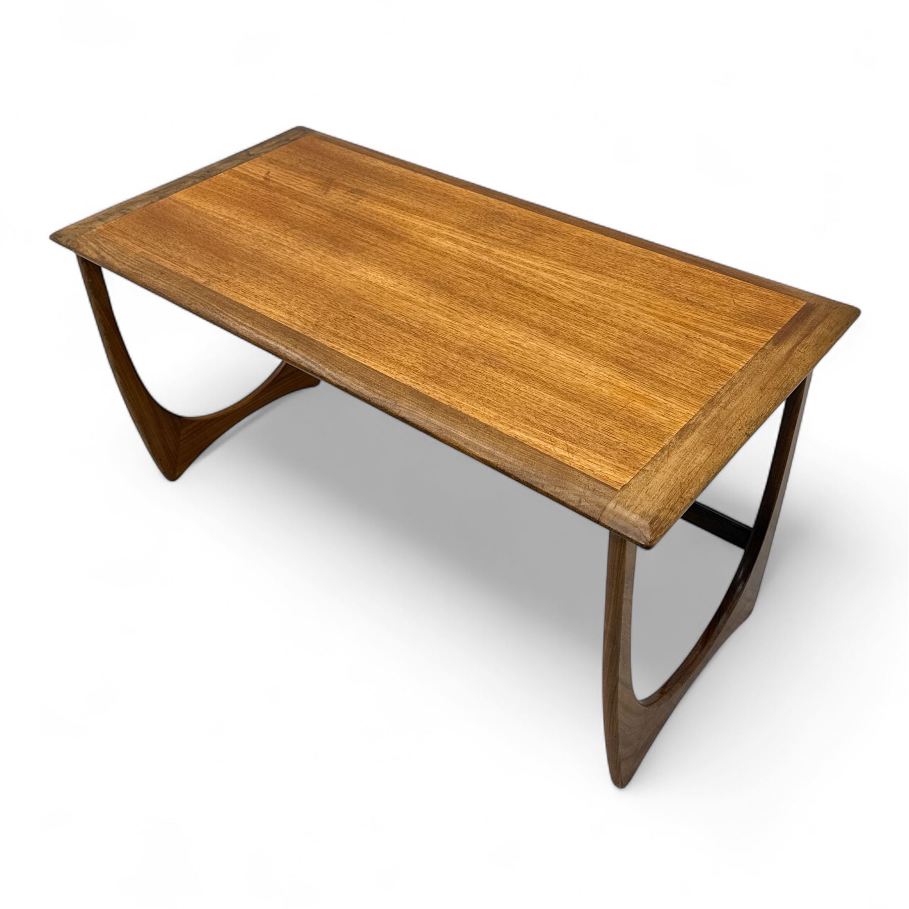 G-Plan - 'Astro' mid mid-century long teak coffee table with two nesting tables, rectangular top with outer banding, above two square top occasional tables on U-shaped end supports united by a stretcher