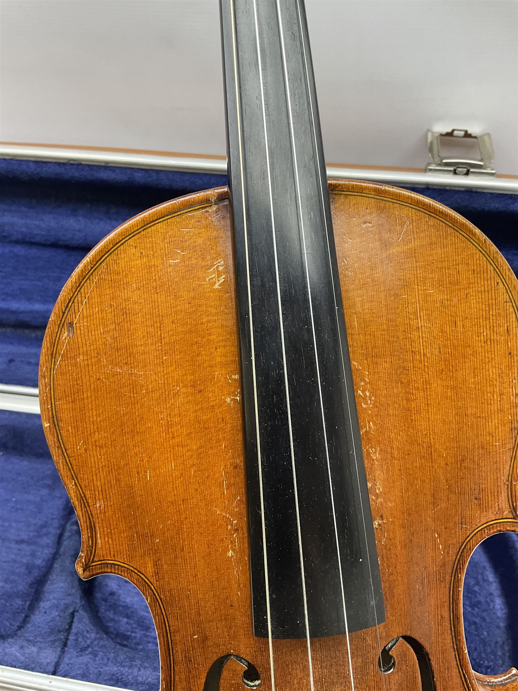 Early 20th century German Ernst Kreusler violin with 36cm two-piece maple back and ribs and spruce top, bears label 'Ernst Kreusler Dresden Anno 1925  Hand made reproduction of Antonius Stradivarius Cremona', overall L59cm; in hard carrying case