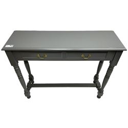 Grey painted side table, moulded rectangular top over two drawers, on turned supports united by stretcher