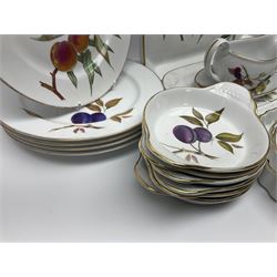 Royal Worcester Evesham pattern dinner wares, including flan dishes, sauce boat, jug, dinner plates, side plates, etc, 