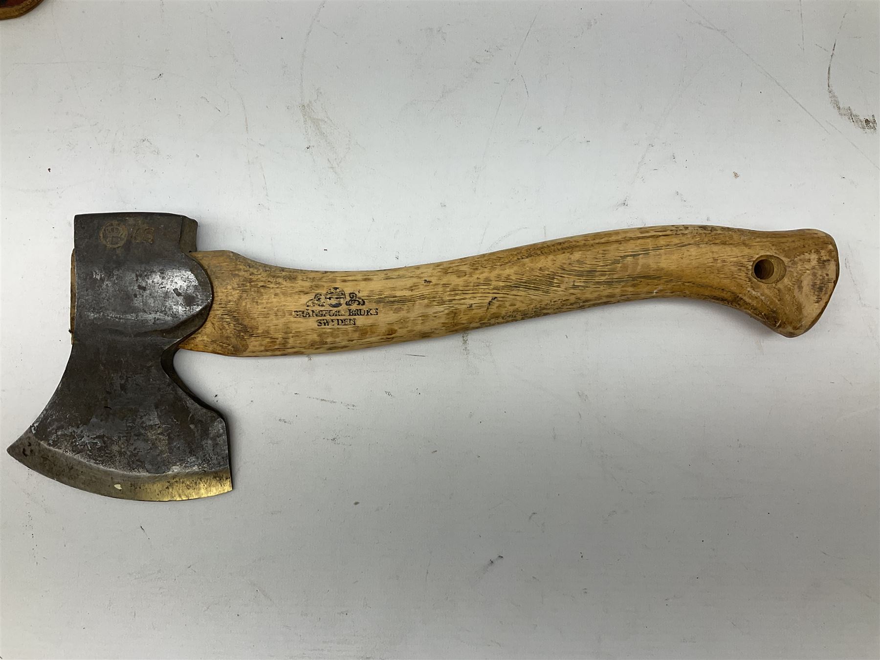 Gransfors Bruk Sweden carving axe, the head stamped both sides including smith's initials, on stamped hickory shaft, in leather sheath L43cm