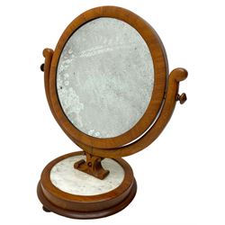 Victorian mahogany framed dressing table mirror, the circular plate held within a swing frame on a C-scroll support, the circular base with a marble inset over compressed bun feet