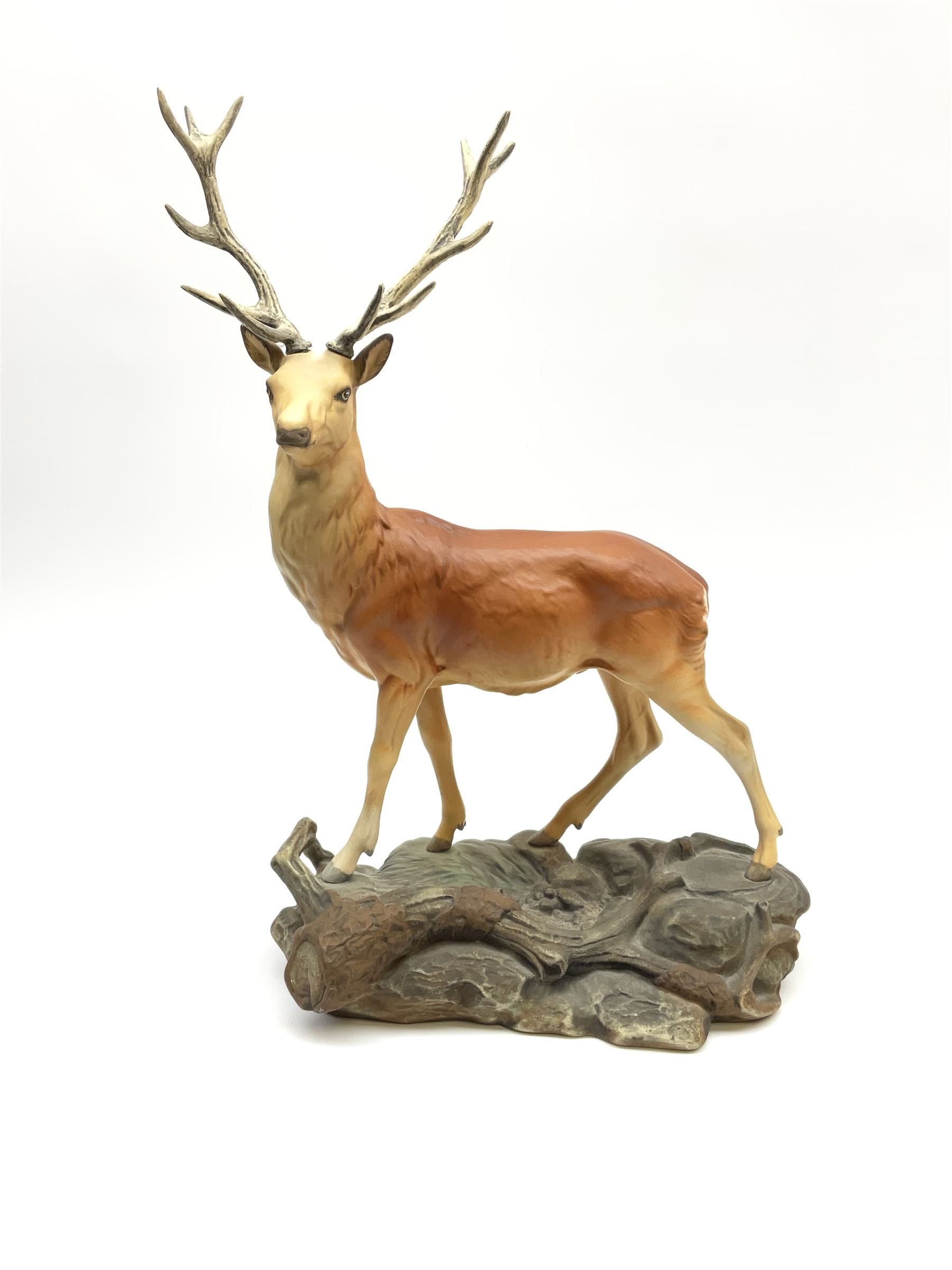 A Beswick Connoisseur matt model of a Stag upon a rocky modelled base, 2629