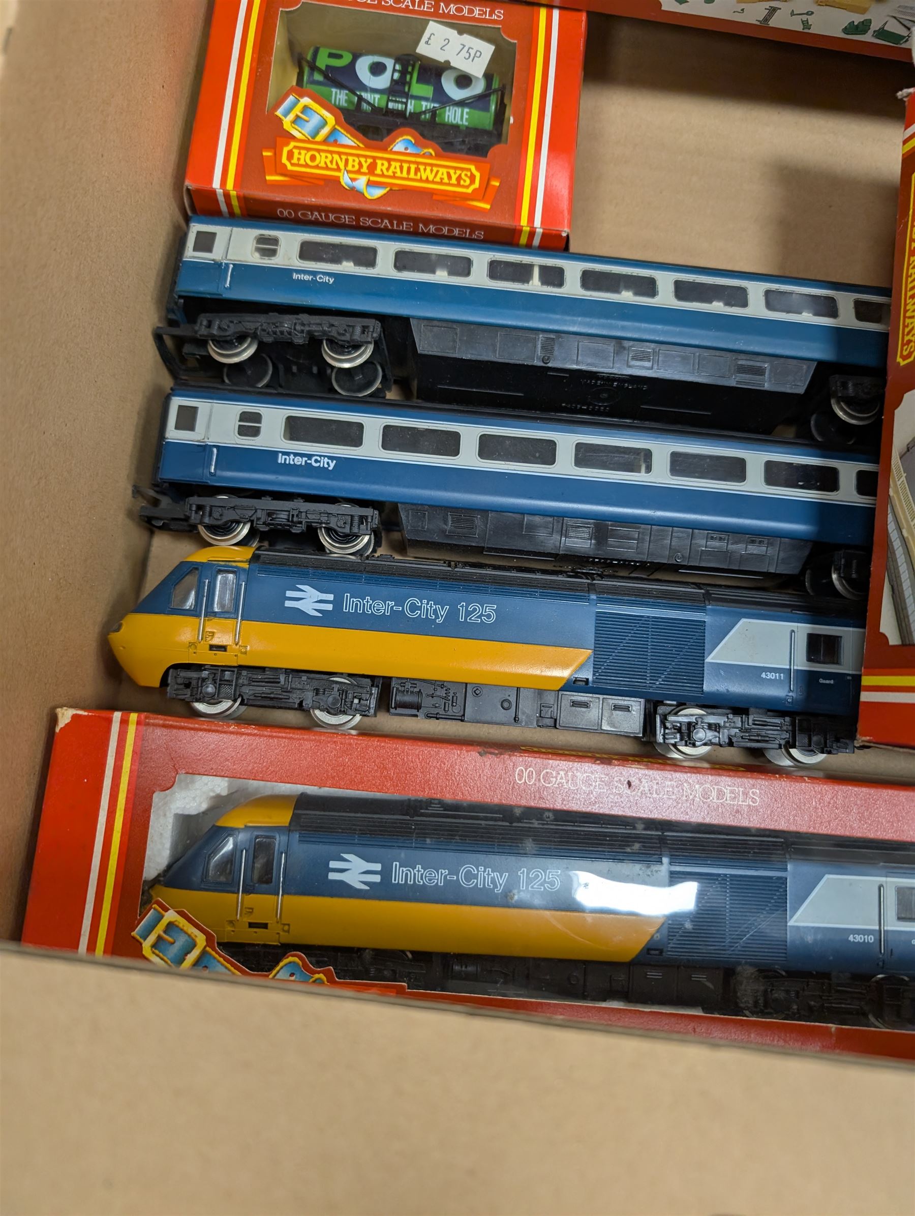 Collection of mostly Hornby '00' gauge model railway, including two Inter-City locomotives and carriages, railway buildings and scenery, track, controllers and other accessories, some boxed and some empty boxes