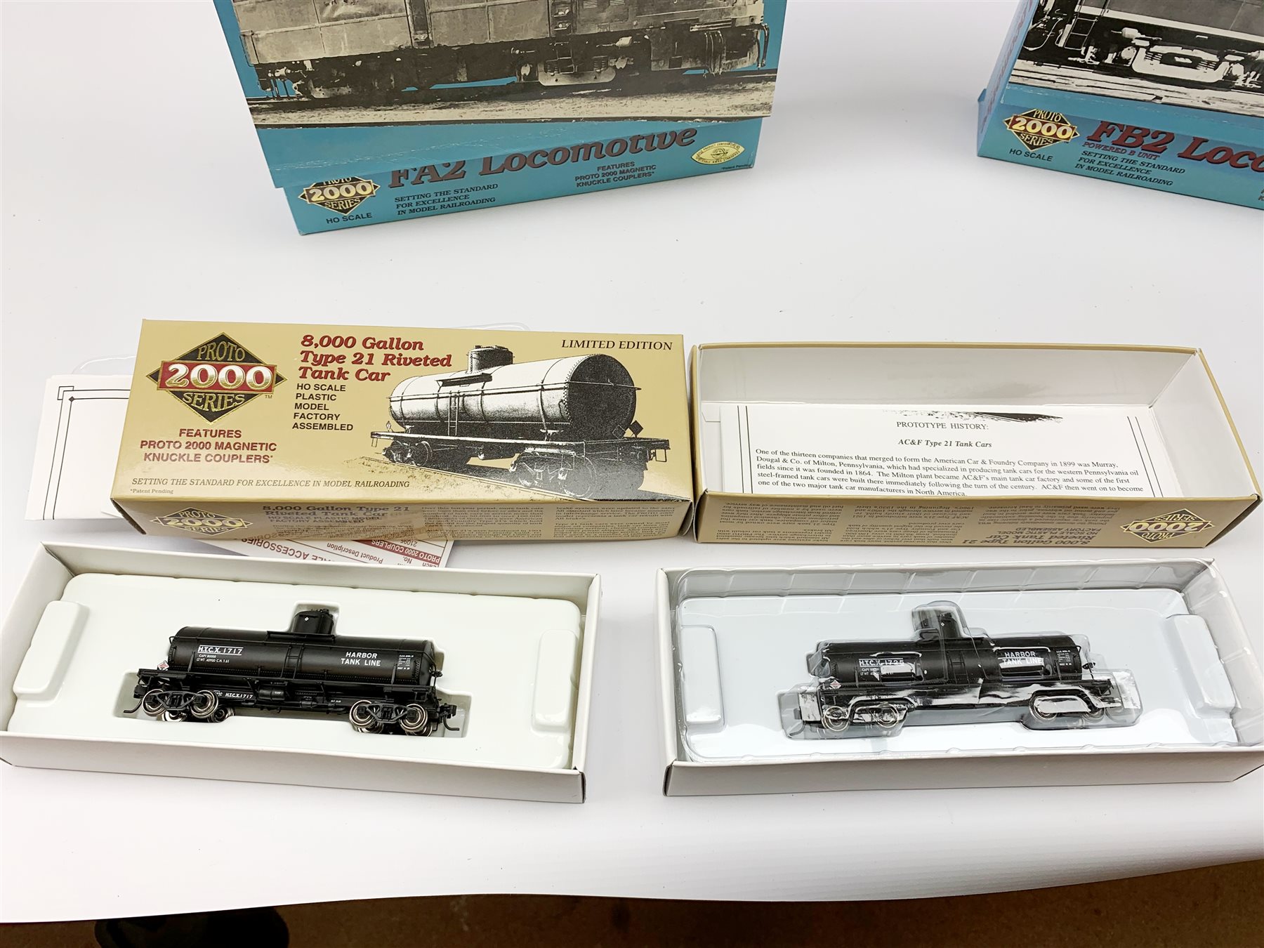 American Life-Like Proto 1000/2000 HO scale - three Baltimore & Ohio locomotives comprising FA2 No.4032, FB2 No.5016 and Budd RDC No.1951; and four 8000 Gallon Type 21 Riveted Tank Cars, one in kit form, two factory built and one kit built, all boxed (7)