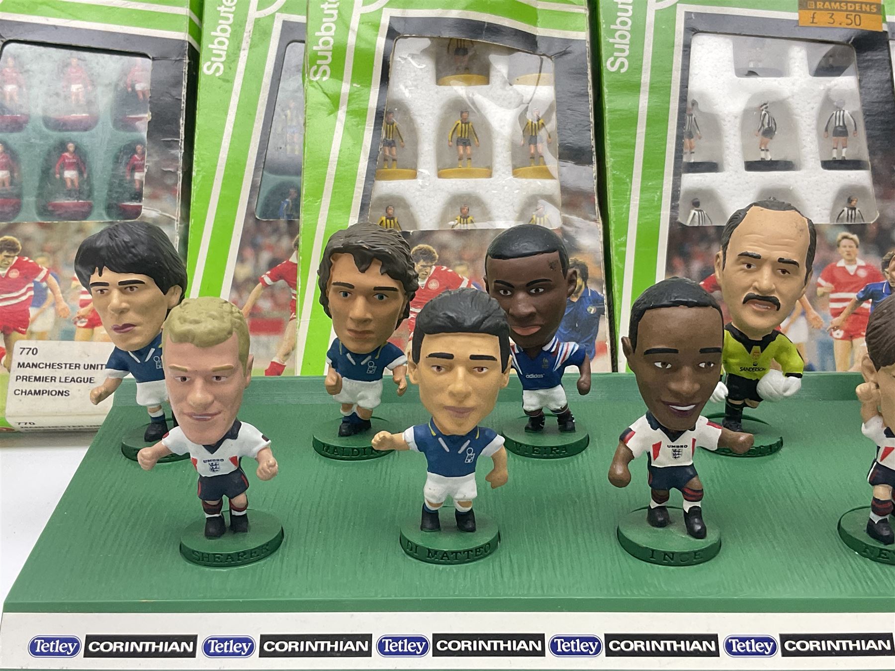 Subbuteo - table football game with plain red and blue teams; looks to be unused in box; six individually boxed additional teams comprising 779 Leeds United 2nd, 770 Manchester United 1993 Premier League Champions, 703 Southampton, 680 Scotland, 287 Notts County/Espinho/Doxa/Grimsby Town and 030 Berwick/East Fife/AEK/Hull City/Lierse; and Corinthian/Tetley Match of the Day Dream Team set of twelve figures on stand