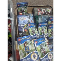 Lego Bionicle and similar part built figures and parts, including boxed sets and loose, together with a Lego Ninjago Build Your Own Adventure set and ten LEDlite Legends of Chima keyrings