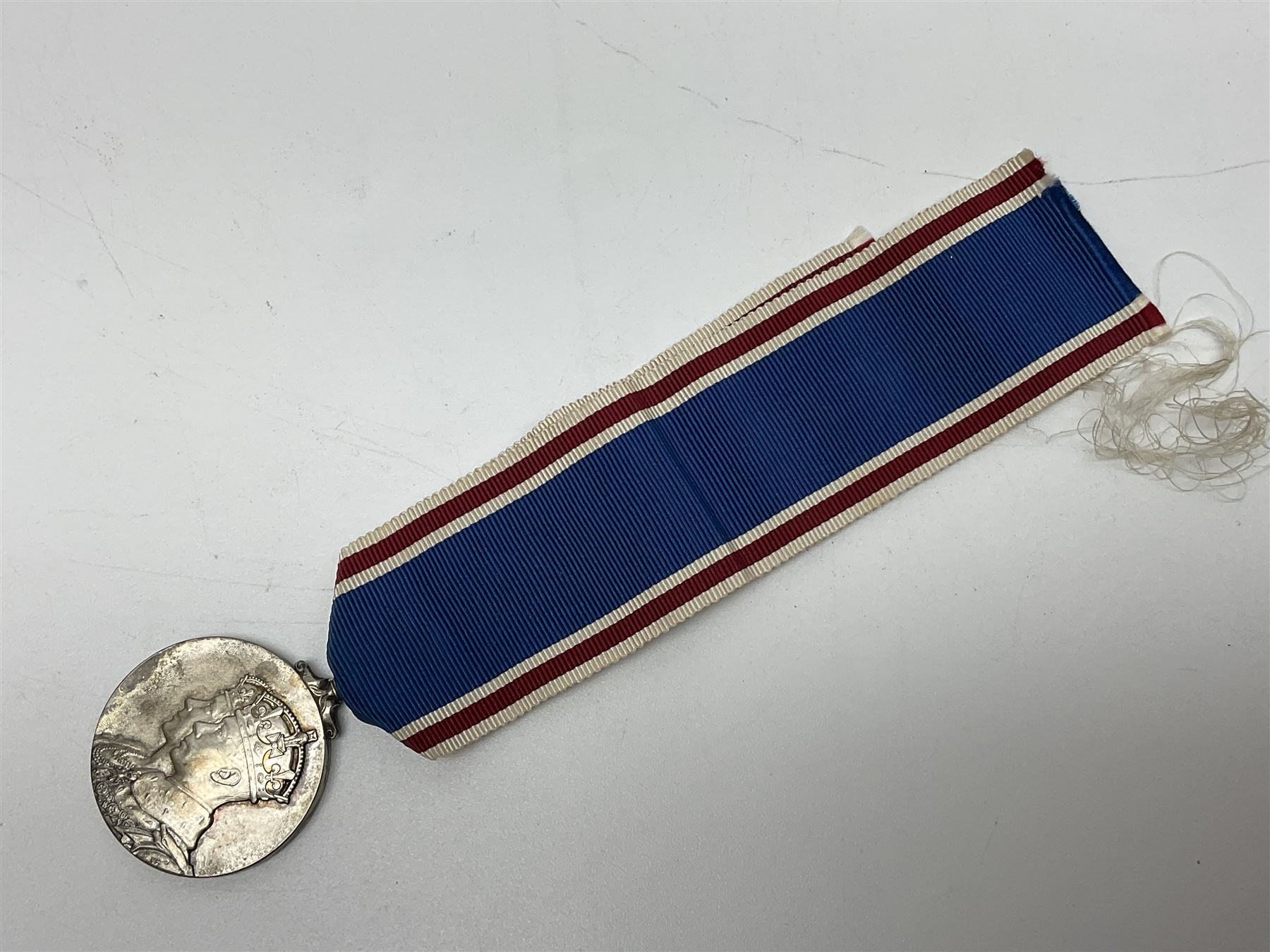 Collection of WW2 and police medals c.1933-1955, awarded to Eric Drinkwater comprising 1939-45 War Medal, Defence Medal, 1939-45 Star and Burma Star, on wearing bar; 1918-62 General Service Medal with Cyprus clasp to P.S. E.G. Drinkwater; boxed; Police Long Service and Good Conduct Medal to Const. Eric C. Drinkwater; cased; Royal Life Saving Society bronze medal to E.C. Drinkwater July 1933; boxed; and George V 1937 coronation medallion; boxed.