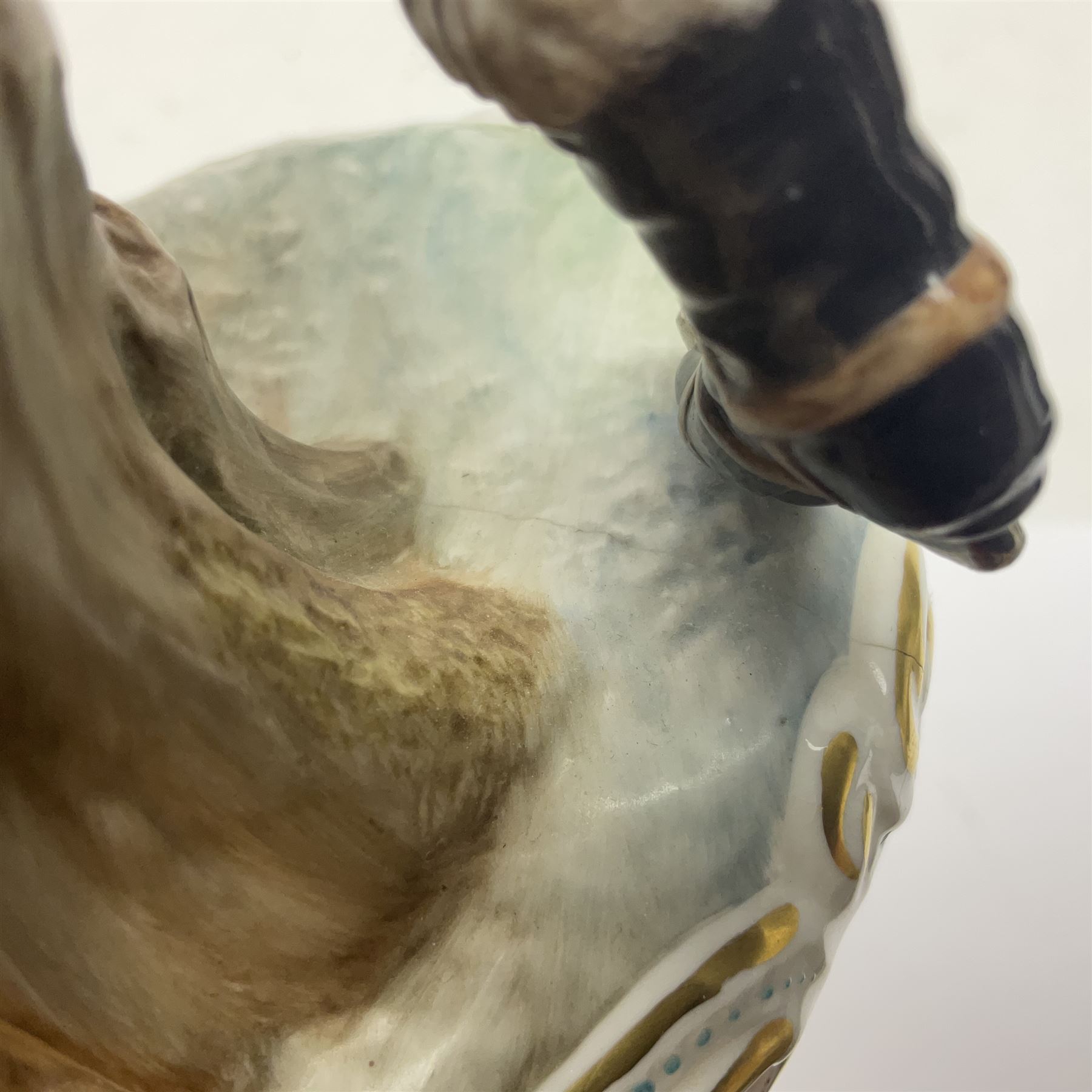 Royal Crown Derby figurine, Winter, modelled as a man with crossed arms on ice skates, by M. Townsend, with printed marks beneath, H24cm