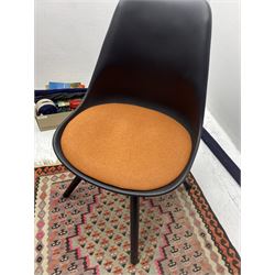 Moulded black polypropylene swivel desk chair with upholstered seat panel; an Eastern kelim rug 140cm x 90cm (2)