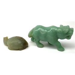 Two carved jade figures, the first modelled as a tiger, L10.5cm, the second as a turtle, L6.5cm. 