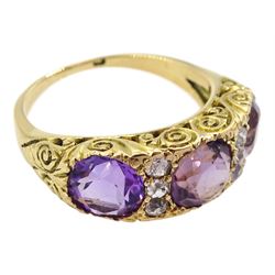 Dutch gold three stone round cut amethyst and six old cut diamond ring, stamped, total amethyst weight approx 3.95 carat