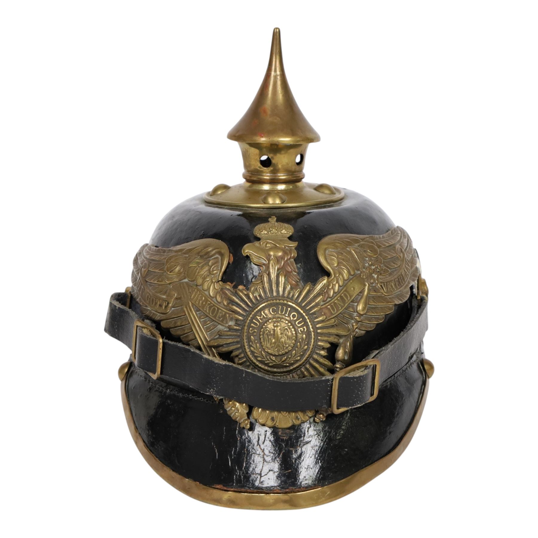WWI Prussian guard regiment Pickelhaube, the black leather skull with brass ball finial, brass eagle helmet plate and leather chin strap, one side with a black  and white cockade, the other black, white and red, 