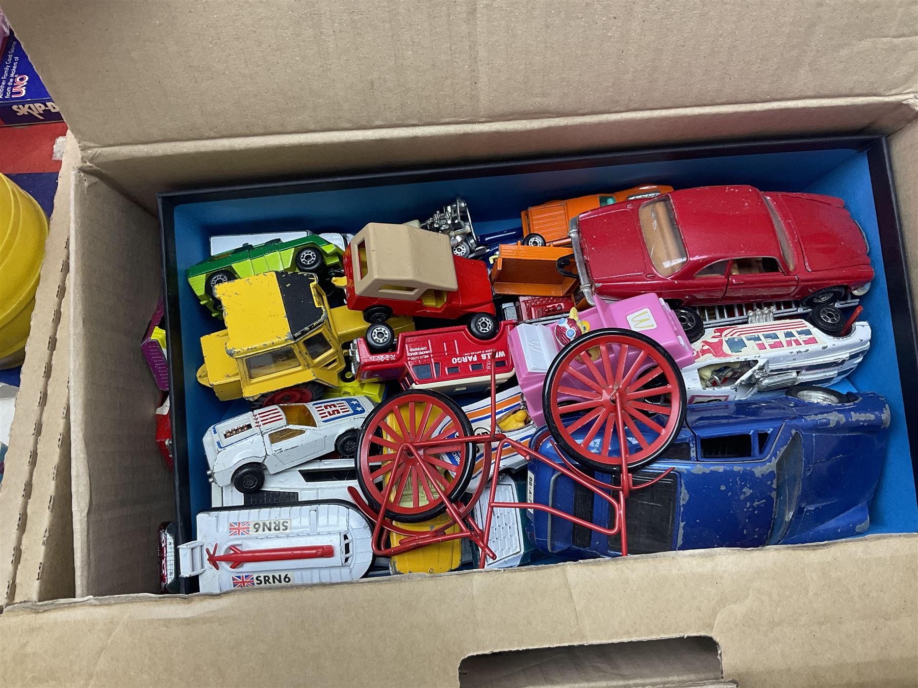 Selcol Beatles New Sound toy guitar, Triang baby walker, Mamod steam engine, wooden Noahs Ark toy, quantity of diecast cars and plastic soldiers and a collection of other toys and board games, in five boxes