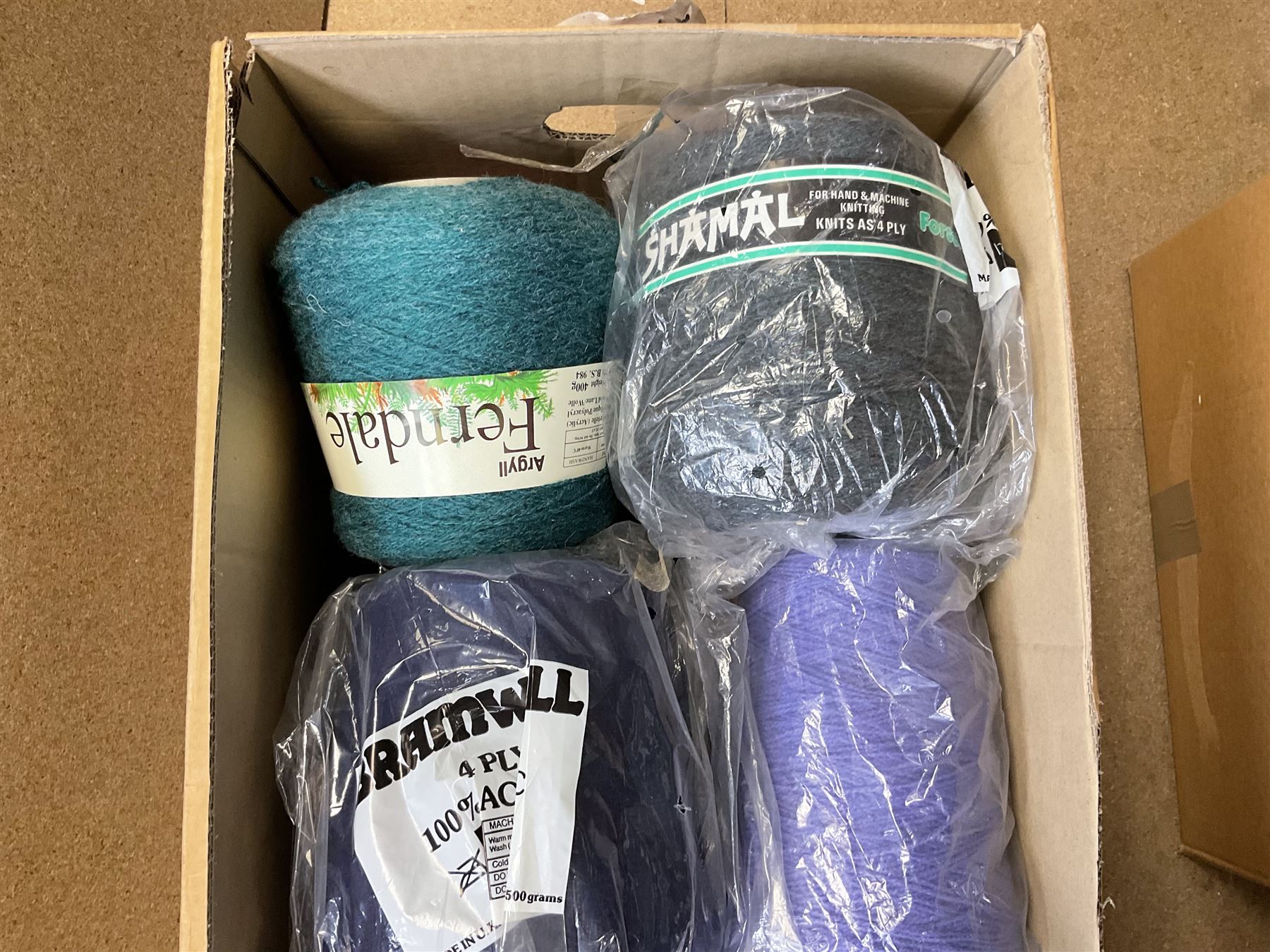  Brother cased knitting machine model KH-890 together with Brother Ribbing attachment model KH-850, knitting machine yarn cones in assorted colours, selection of knitting patterns etc