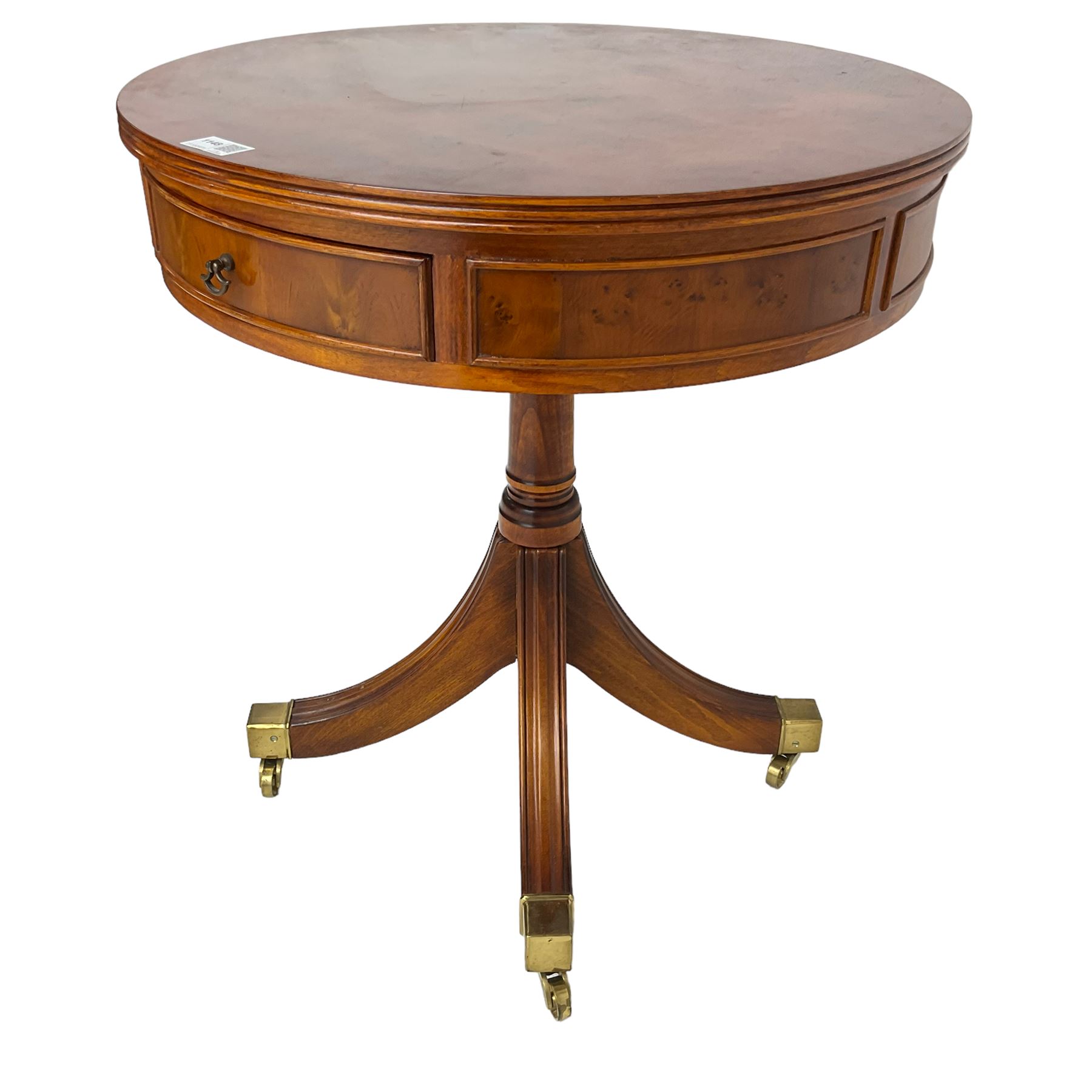 Wade - Georgian design yew wood drum side table, banded circular top with reeded edge, fitted with single cock-beaded drawer, raised on turned pedestal with splayed supports and castors