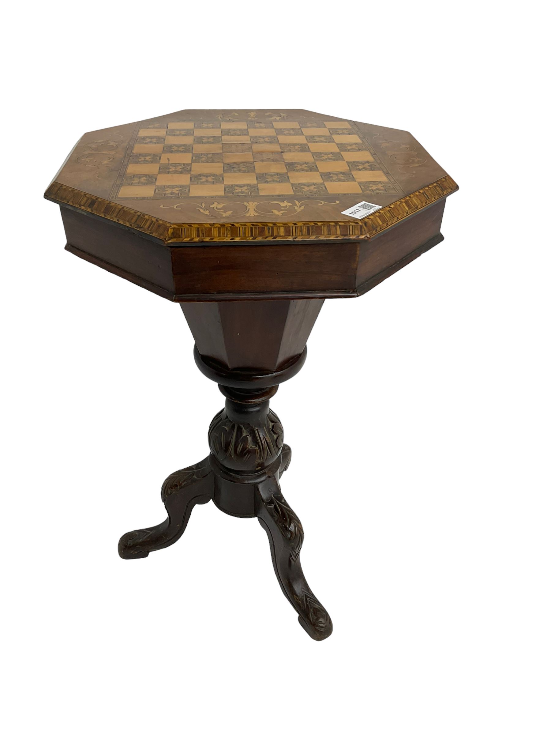Late 19th century inlaid walnut sewing or work table, octagonal hinged top with satinwood and ebony chessboard inlay, surrounded by foliate decoration, the edges inlaid with crossbanding and stringing, fitted interior with chess pieces, raised on baluster pedestal carved with acanthus leaves on a tripod base 