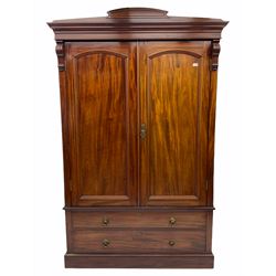 Late Victorian figured mahogany double wardrobe, two doors above two drawers