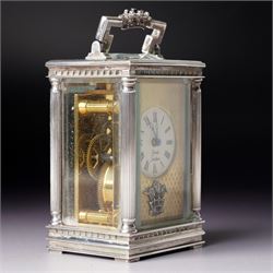 Chas Frodsham -  Miniature carriage clock with platform lever escapement commemorating the marriage of Prince Charles and Lady Diana Spencer, the white dial with an engine turned gilt surround and fleur de lis in silver case with fluted columns and bevelled glass panels H10cm  No.43/1000 London 1981 with key
