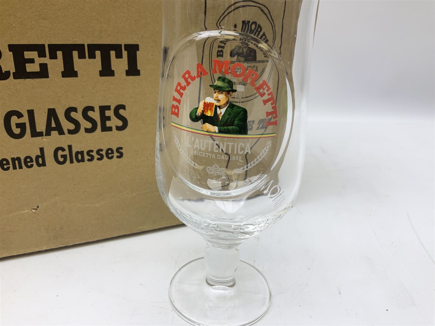 Set of 24 Birra Moretti pint glasses in original box