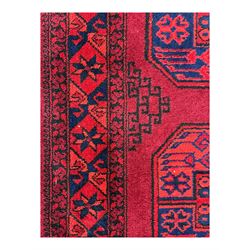 Persian Qashqai crimson ground rug, the field with central indigo and yellow medallion with geometric motifs, flanked by smaller medallions, border with repeating patterns (112cm x 200cm); Turkish Kazak light blue ground rug (109cm x 193cm); red ground runner with three octagonal medallions (69cm x 138cm)