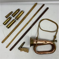 WW2 copper and brass bugle inscribed George Potter & Co, Aldershot 1939 L28cm; two cane and one leather covered swagger sticks; and three small pairs of plain brass shell cases (10)